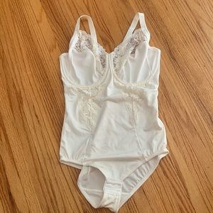 Cream shape wear body suit.